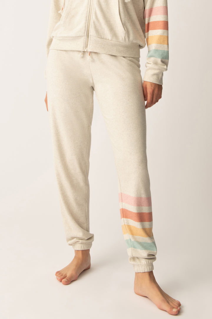 Women's jogger pant in oatmeal with graphic stripe print on leg. Tie waist.
