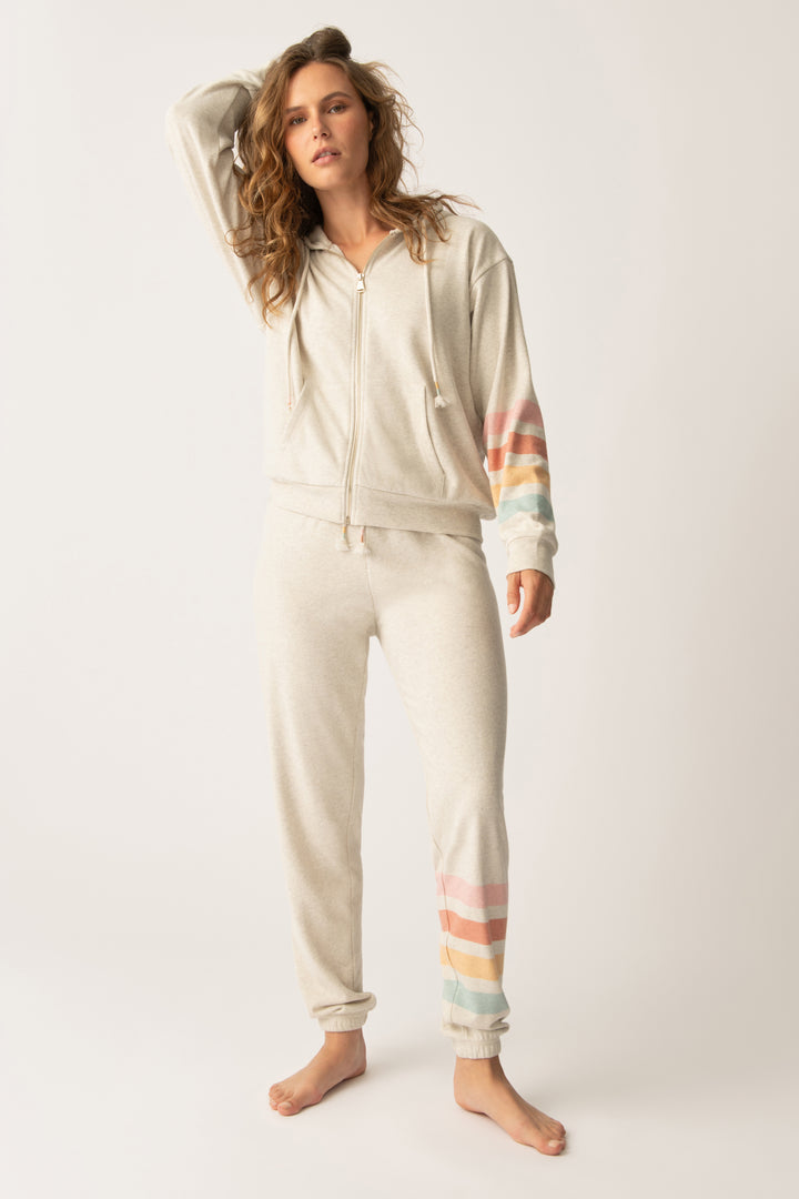 Women's jogger pant in oatmeal with graphic stripe print on leg. Tie waist.