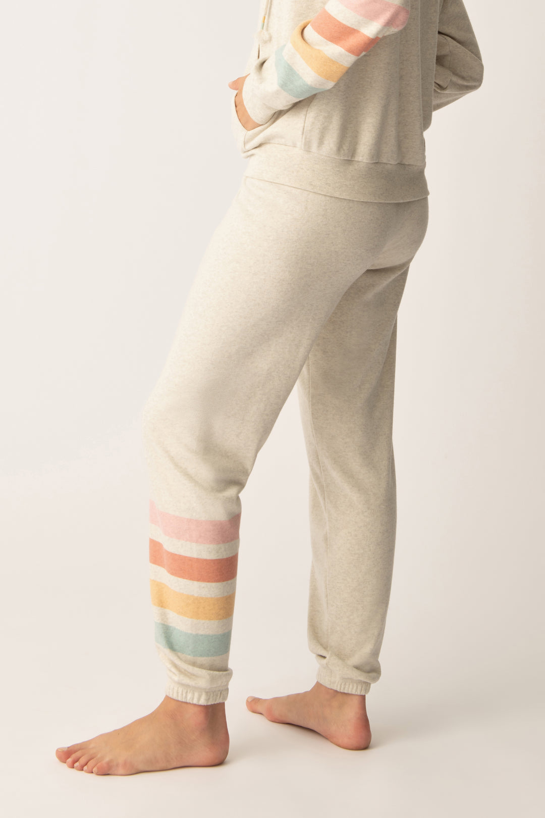 Women's jogger pant in oatmeal with graphic stripe print on leg. Tie waist.