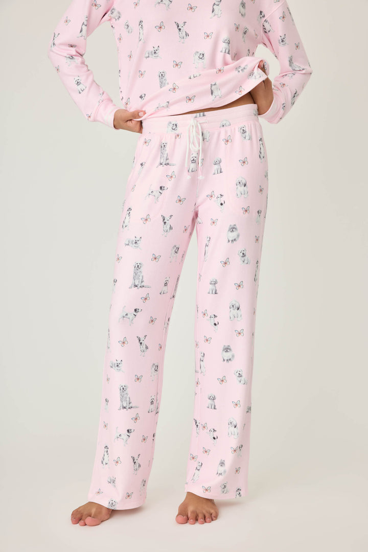 Pink dog-printed pajama pant for women with tie waist & side pockets.