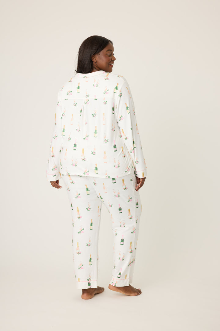Women's white collared pj top and tie waist pant with champagne pattern.