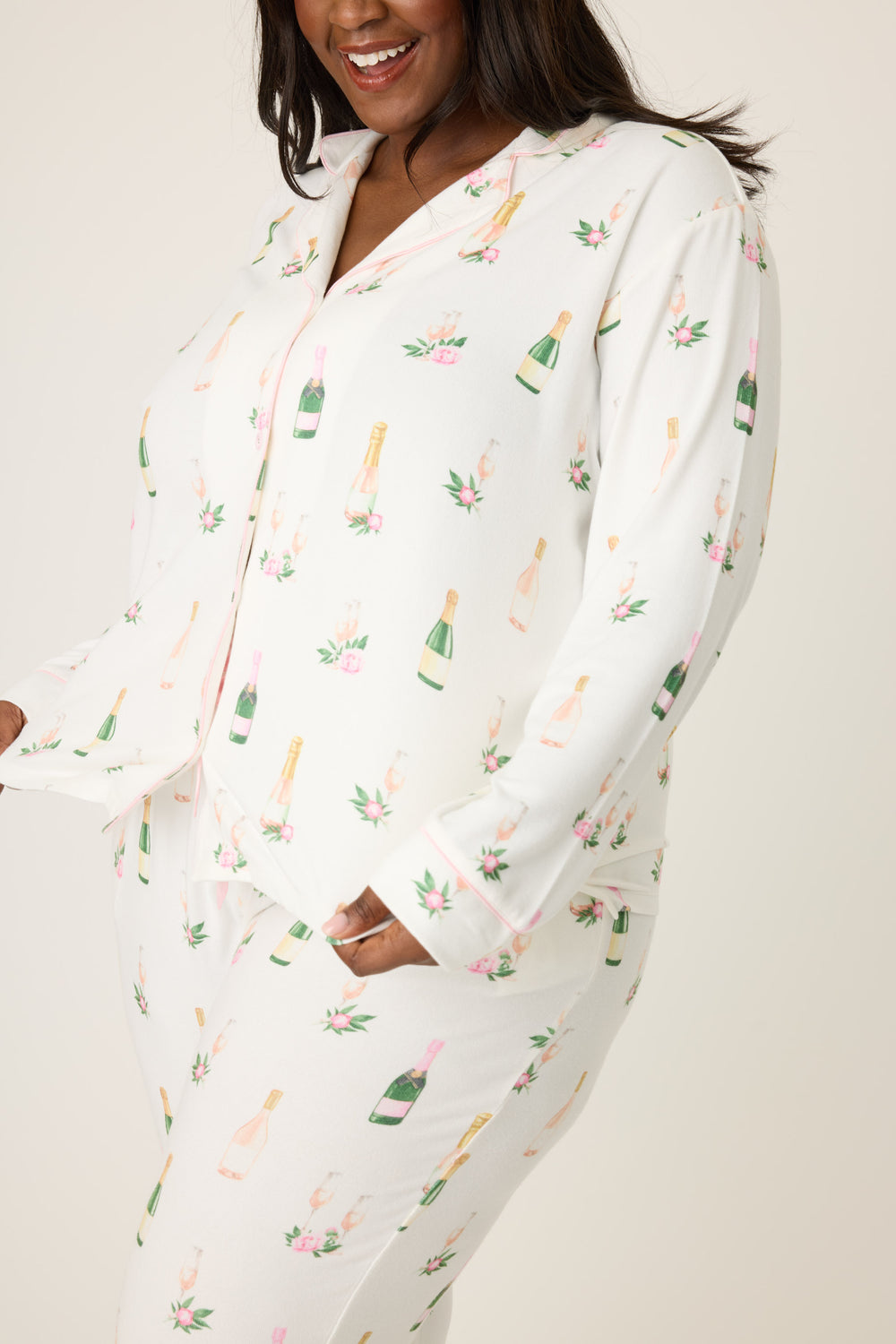 Women's white collared pj top and tie waist pant with champagne pattern.