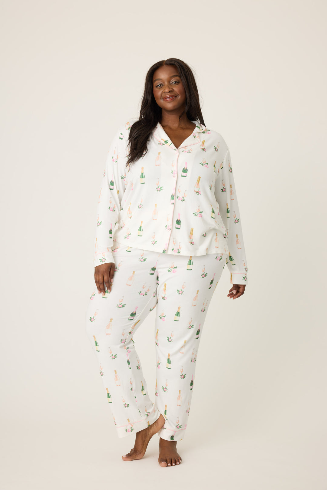 Women's white collared pj top and tie waist pant with champagne pattern.