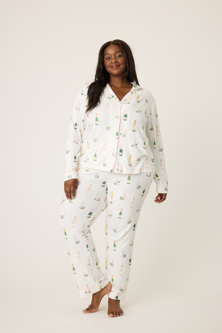 Women's white collared pj top and tie waist pant with champagne pattern.