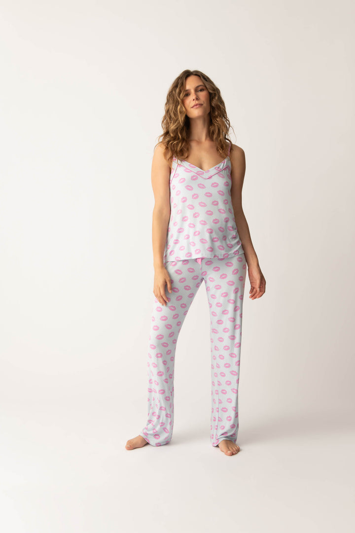 Women's blue pj tank with shelf bra and tie waist pants with pink kiss pattern.