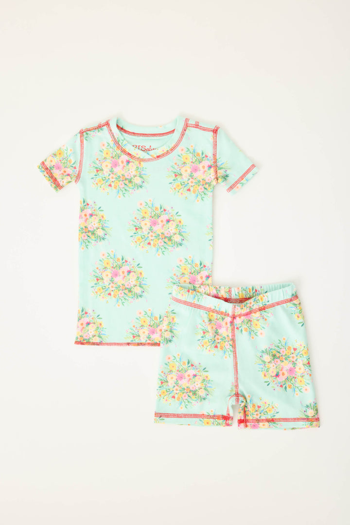 Exclusive collab with pop-culture artist Adrian Valencia. Kids' two-piece pajama set top & pant.