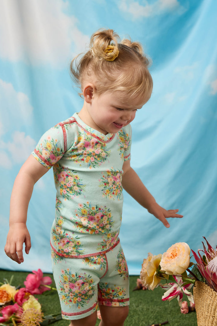 Exclusive collab with pop-culture artist Adrian Valencia. Kids' two-piece pajama set top & pant.