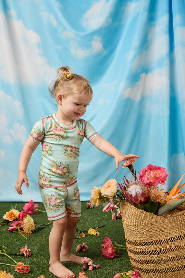 Exclusive collab with pop-culture artist Adrian Valencia. Kids' two-piece pajama set top & pant.