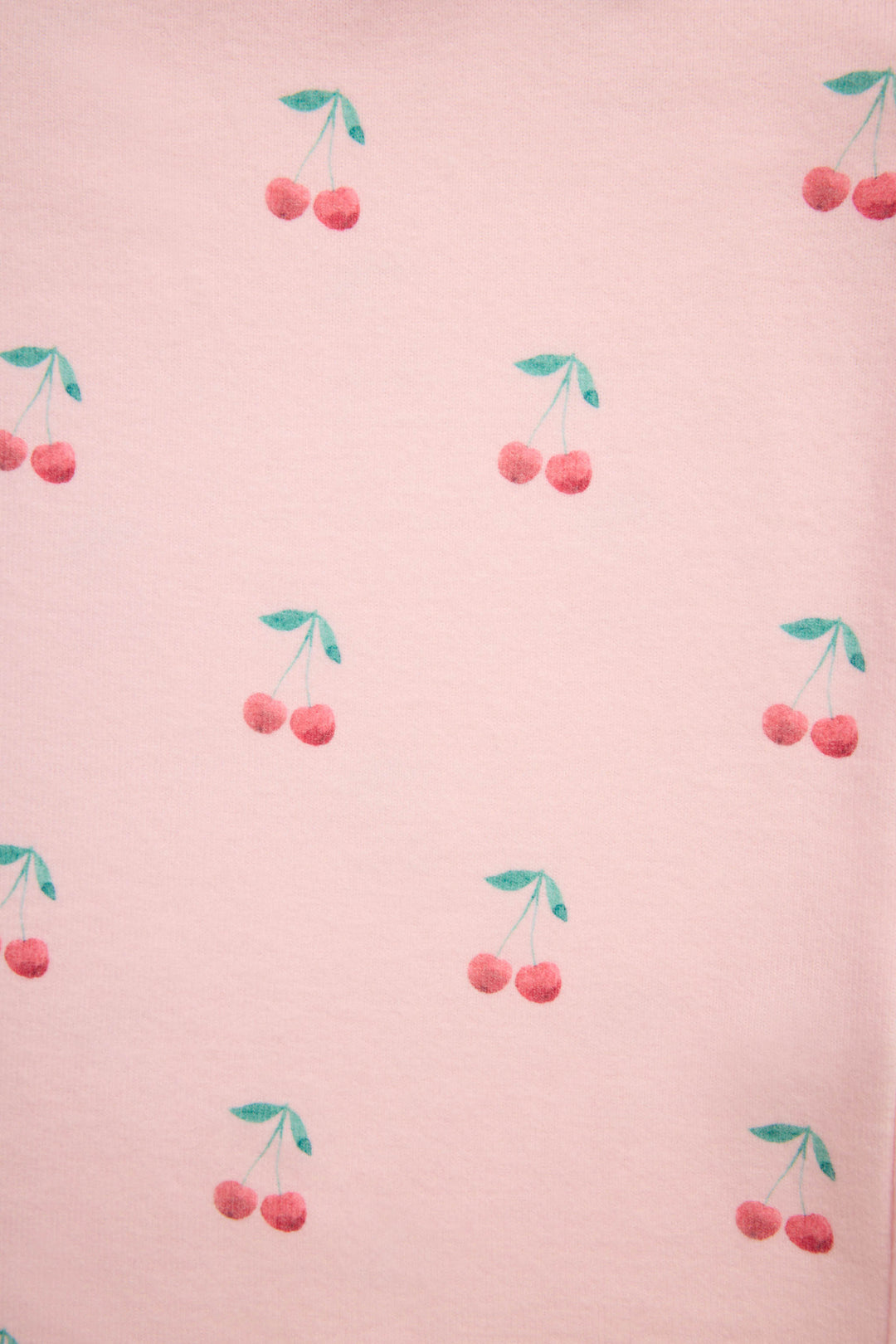 Women's pink jammie top and banded pj pant with cherry pattern.