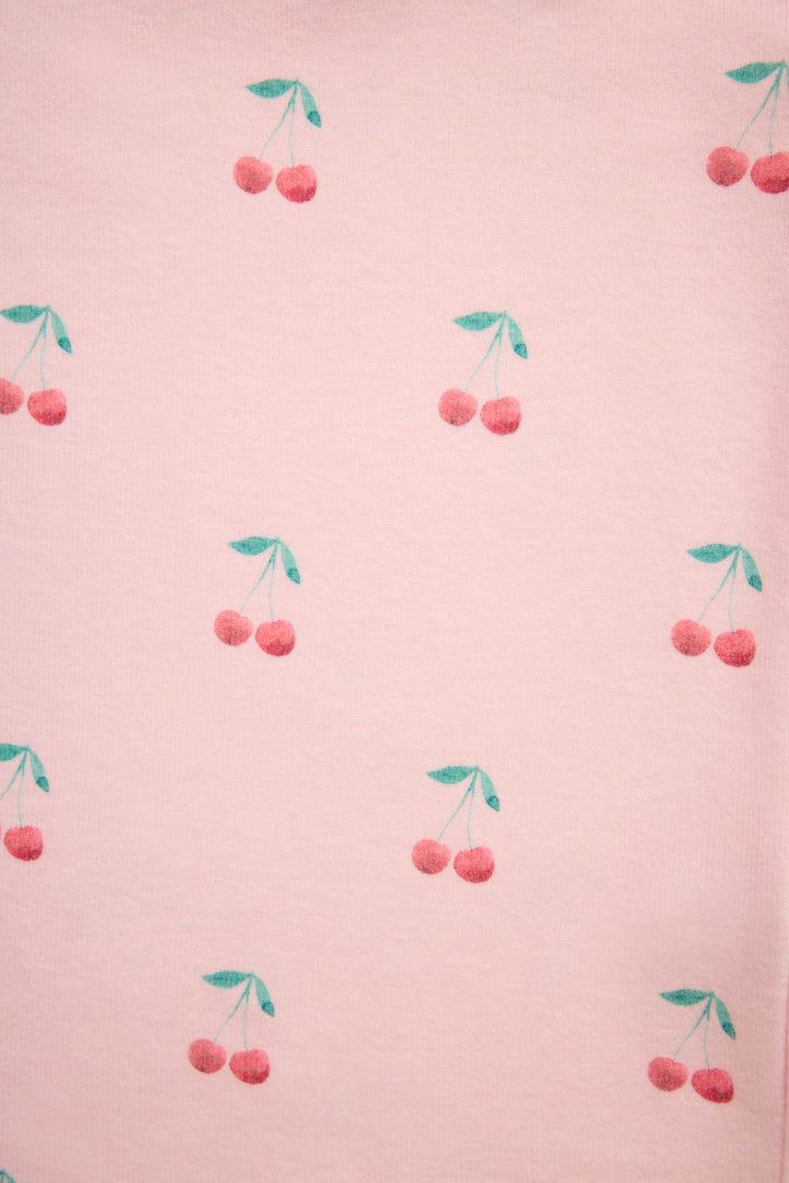 Women's pink jammie top and banded pj pant with cherry pattern.