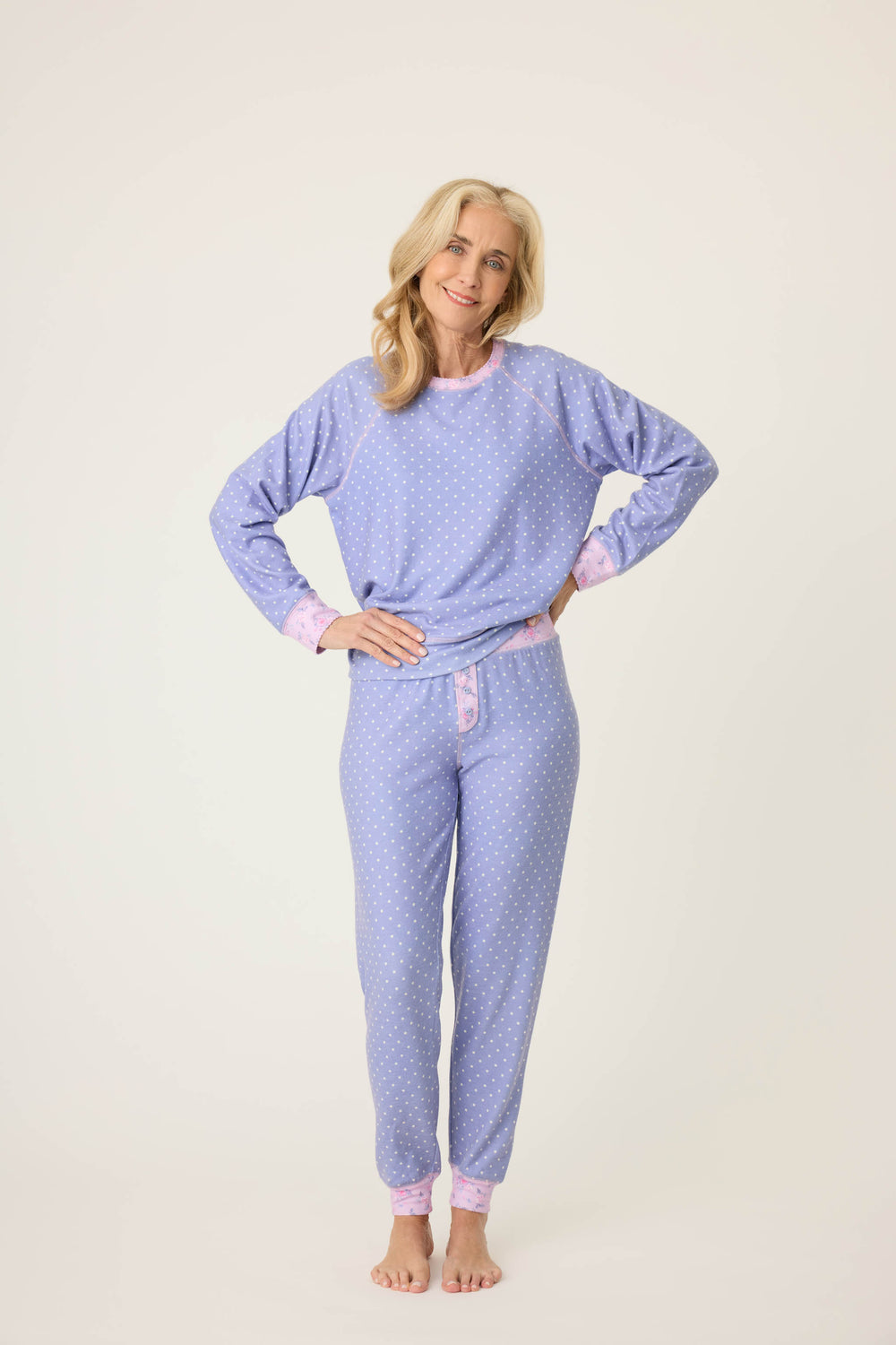 Women's jammie set with long sleeve top & banded pj pant. Peachy jersey in blue polka dot with contrast floral cuffs.