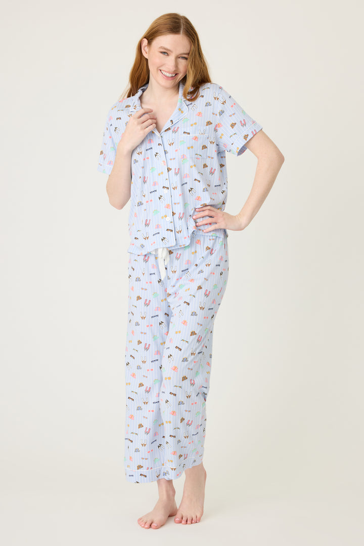 Women's breathable cotton-modal jersey short sleeve pajama set in light blue fashion shoe print. With blue contrast piping & tie. Button-front top & open leg pant.