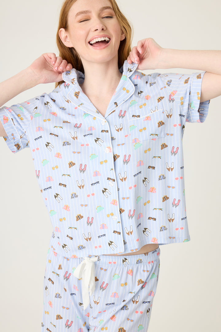 Women's breathable cotton-modal jersey short sleeve pajama set in light blue fashion shoe print. With blue contrast piping & tie. Button-front top & open leg pant.