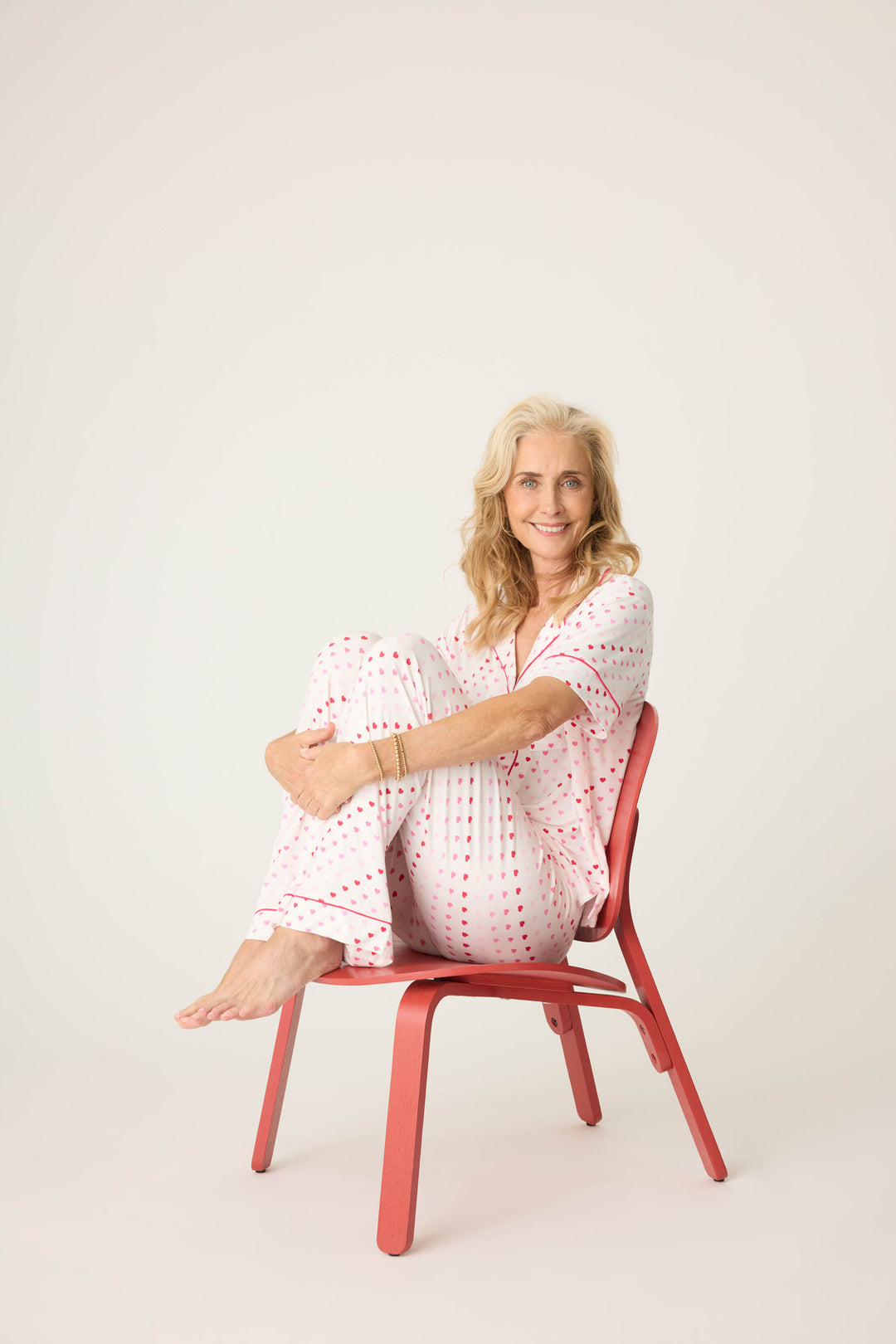 Women's ivory & red heart print pajama set, with short sleeve button top & pj pant.