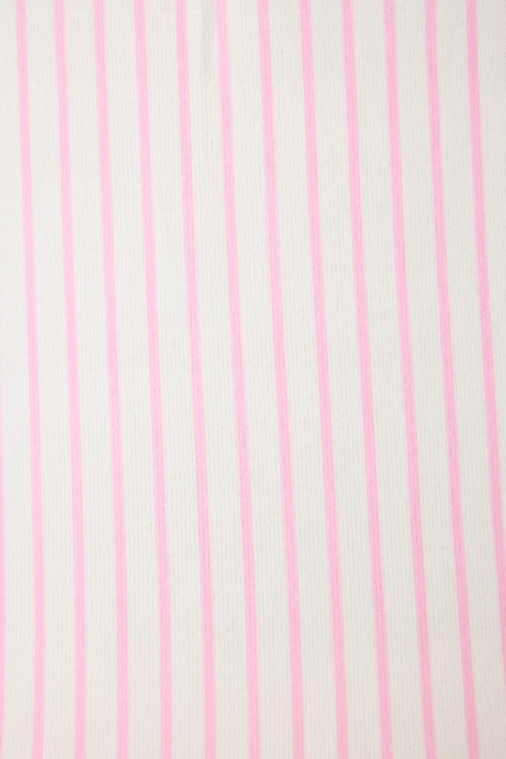Ivory & pink striped pajama set in butter jersey. Button front top & tie pant have contrast pink piping. Includes embroidered eyemask "Apres Pickelball". Chest pocket with embroidery.
