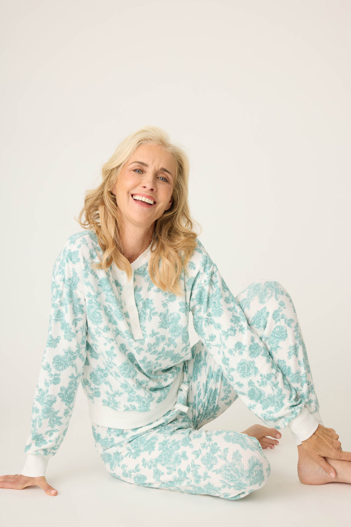 Women's white pj jammie top and banded jogger pant with jade floral pattern.