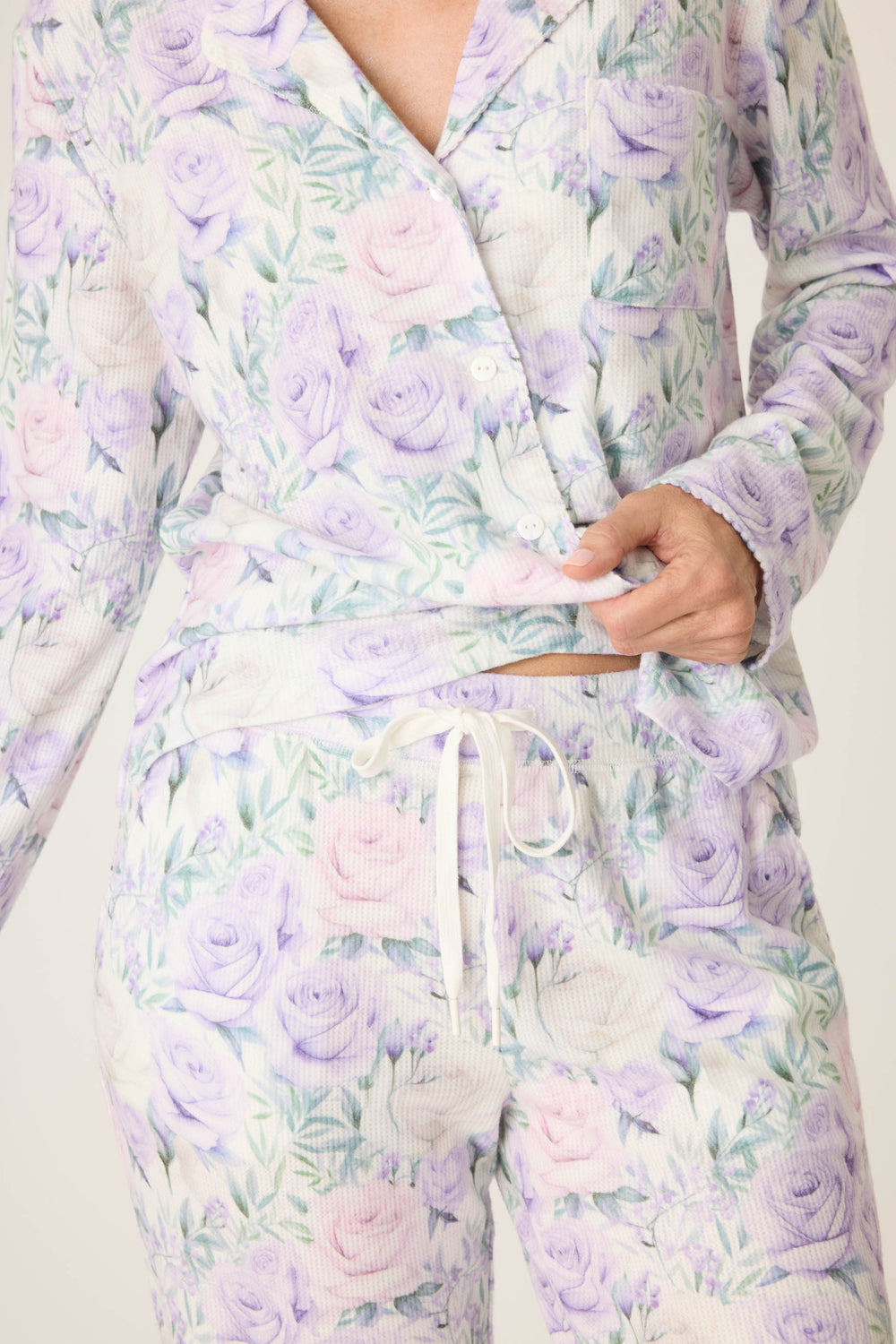 Women's lilac rose patterned collared pj long sleeve and tie waist pants.