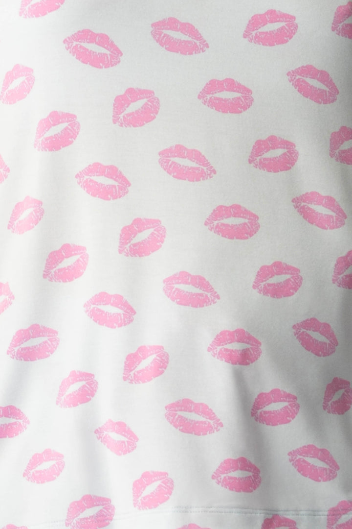 Women's blue pj tank with shelf bra and tie waist pants with pink kiss pattern.