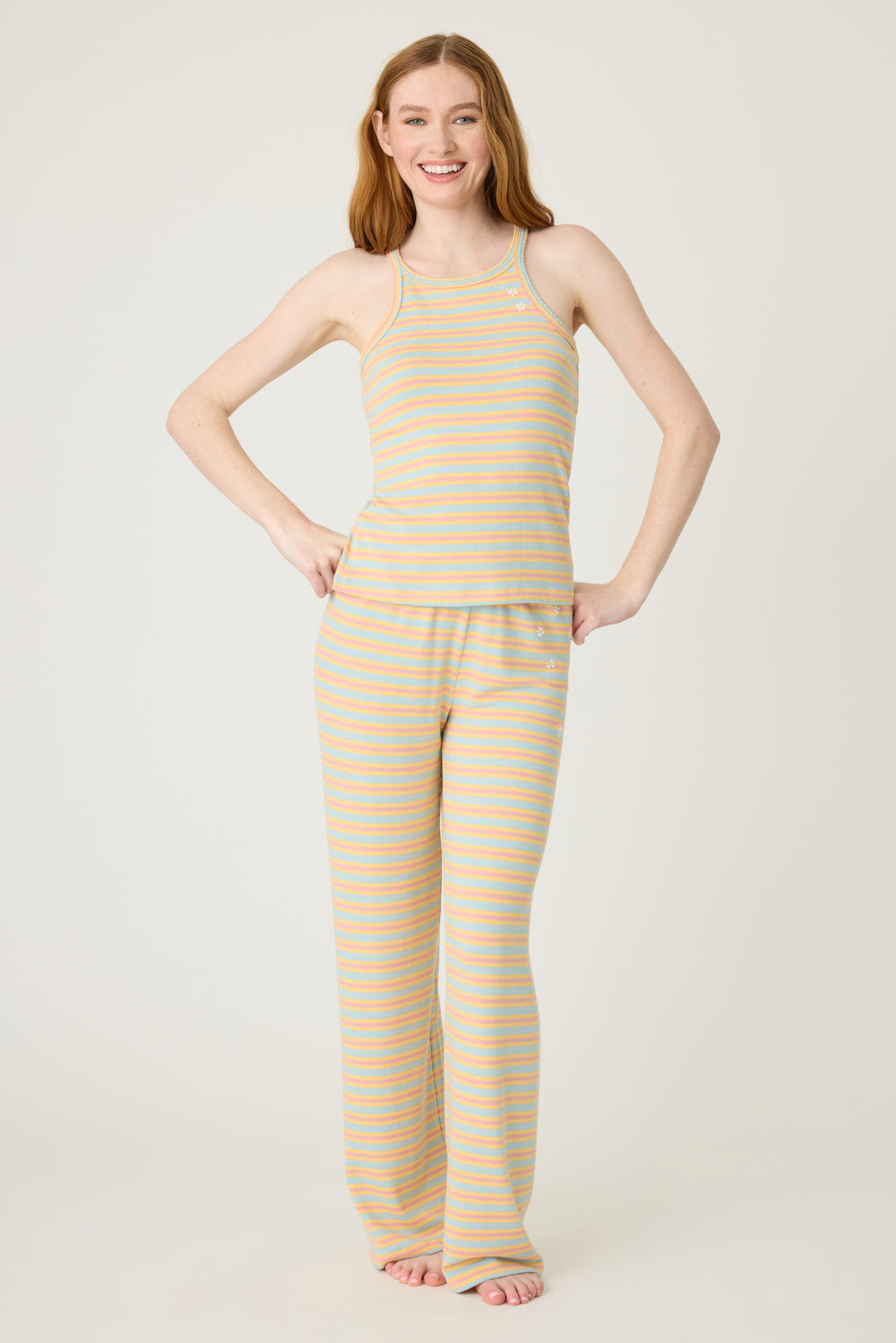 Multi-striped lounge set tank top & open leg lounge pant in orange-sage-dusty pink. With small floral embroidery details.