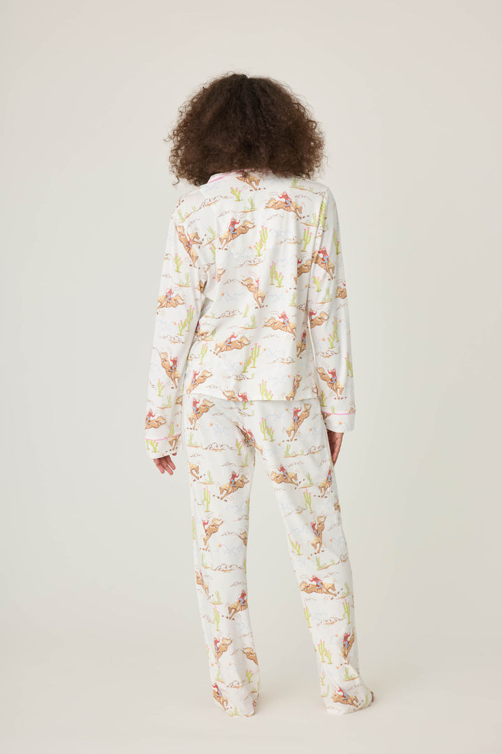 Natural Western print women's classic pj set in cotton-blend jersey. Button front top & tie waist pant with piping.