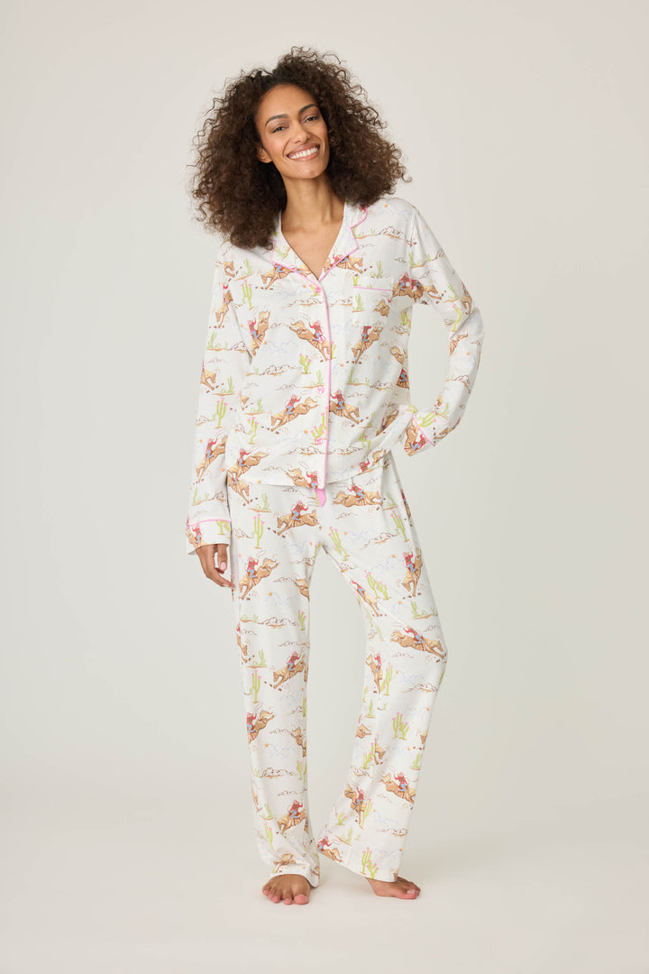 Natural Western print women's classic pj set in cotton-blend jersey. Button front top & tie waist pant with piping.