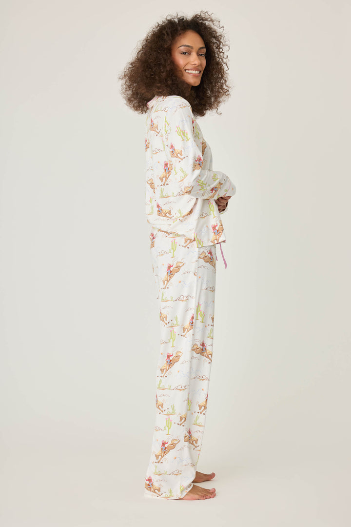 Natural Western print women's classic pj set in cotton-blend jersey. Button front top & tie waist pant with piping.