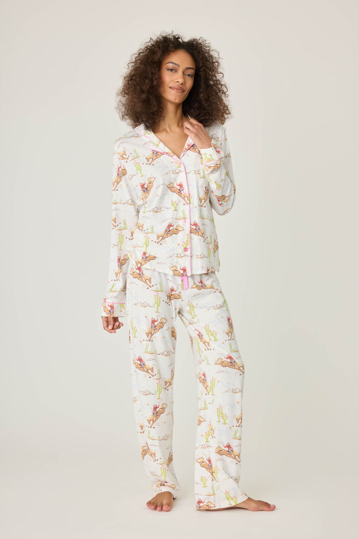 Natural Western print women's classic pj set in cotton-blend jersey. Button front top & tie waist pant with piping.