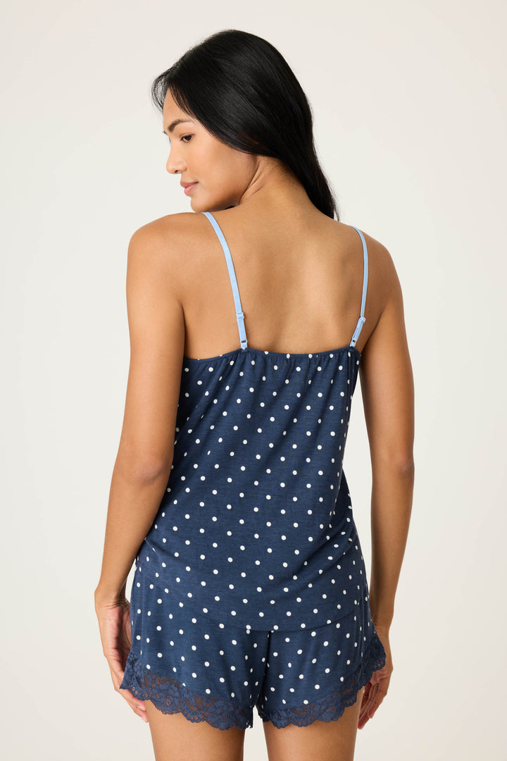 Women's navy blue w/ivory polka dot camisole & short sleep set in modal jersey. Cami has adjustable straps & lace inset neckline. Short has contrast tie-waist & lace hem.