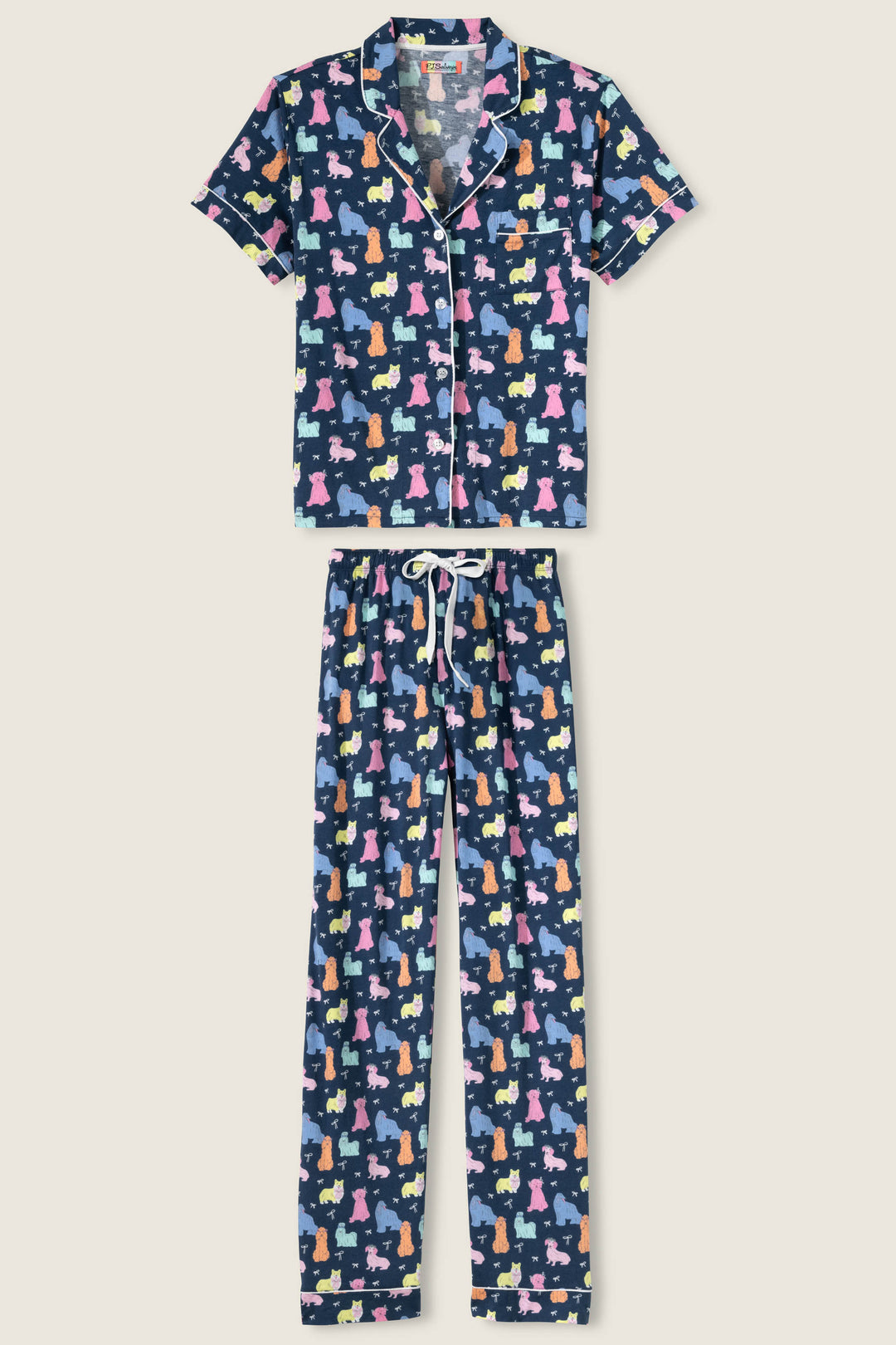 Women's breathable cotton-modal jersey short sleeve pajama set in navy w/pastel dog print with contrast ivory piping. Button-front top & open leg tie-waist pant.