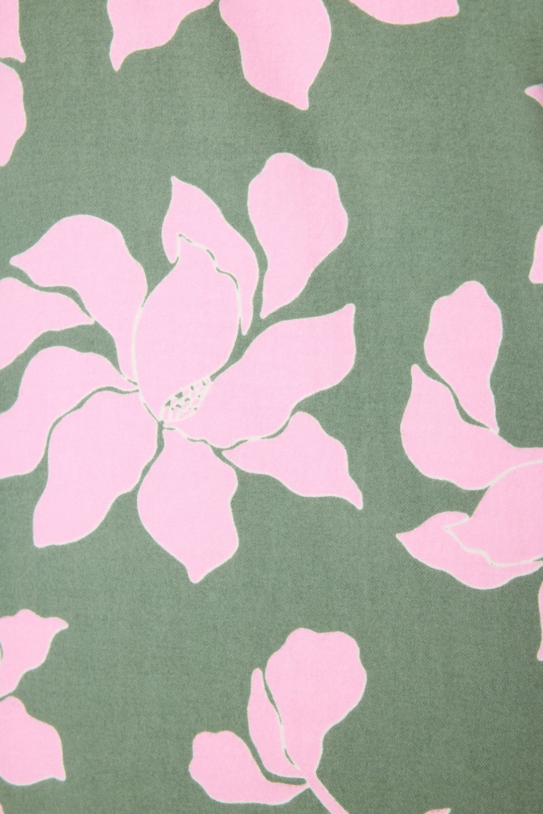 Women's cotton flannel pajama set in green & pink poinsettia print. Button-front collared top & tie-waist pant. Embroidered sleeve cuff "Find Peace Within". Includes matching hair wrap.