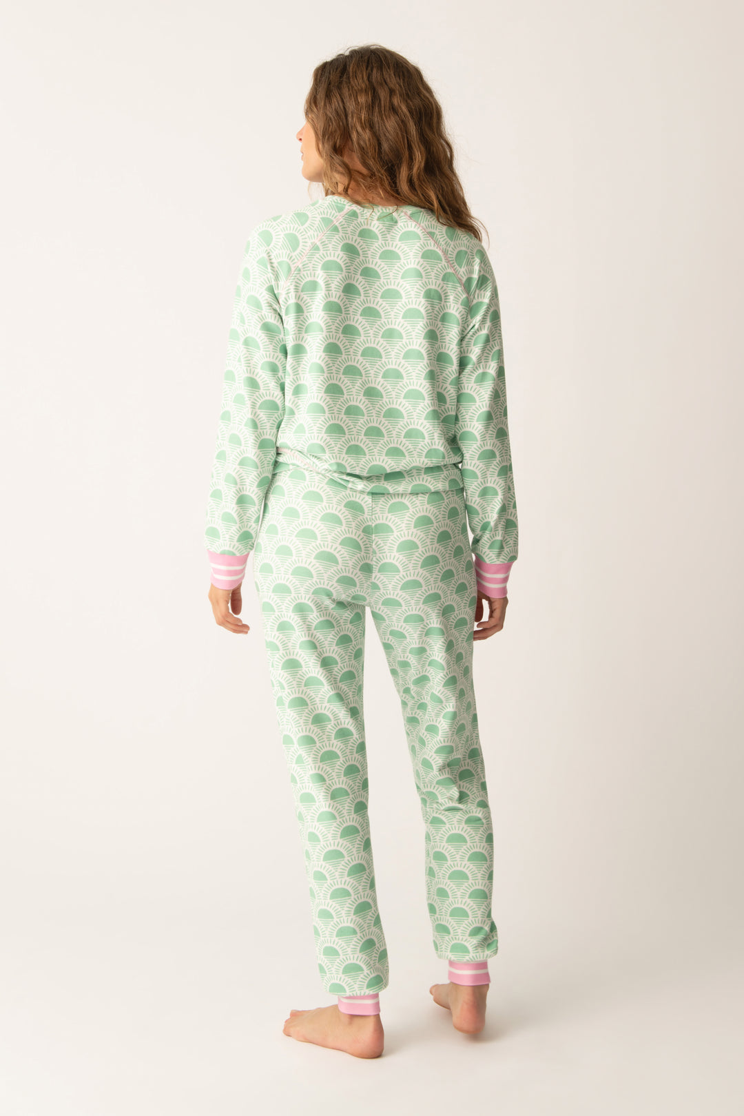 Women's lounge set in racket-sun printed peachy in ivory-green pattern, with pink & green stripe details.
