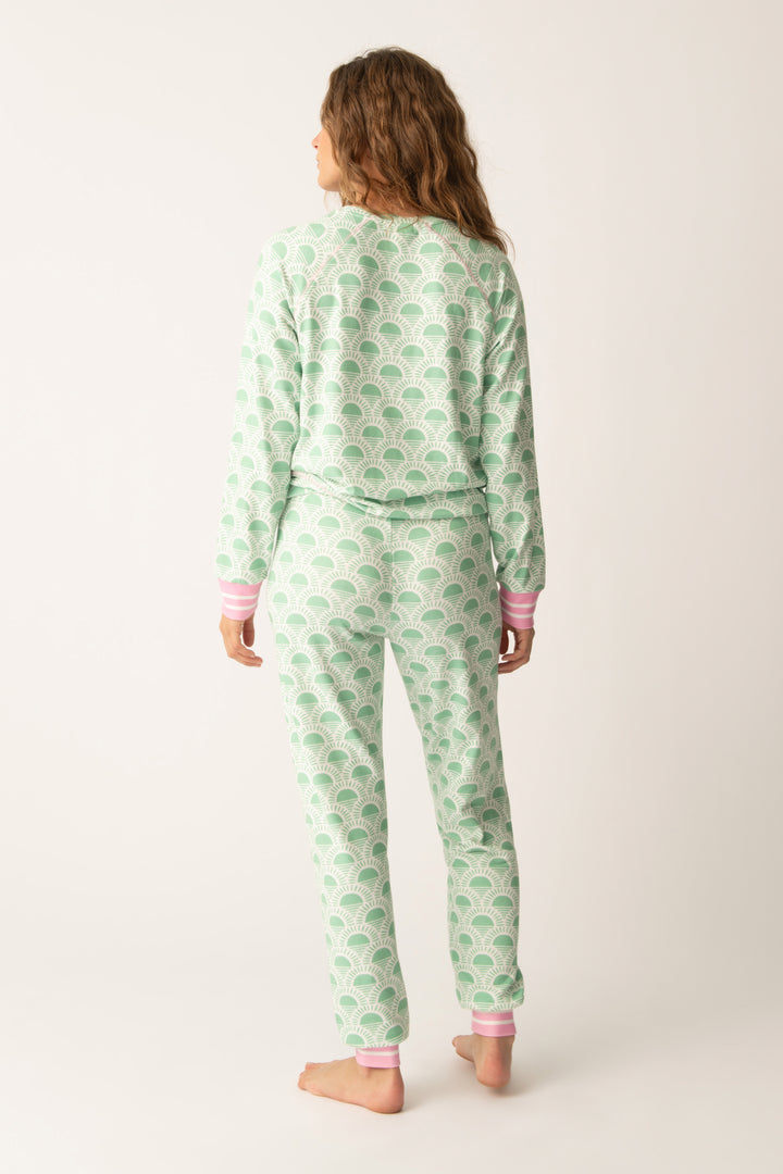 Women's lounge set in racket-sun printed peachy in ivory-green pattern, with pink & green stripe details.