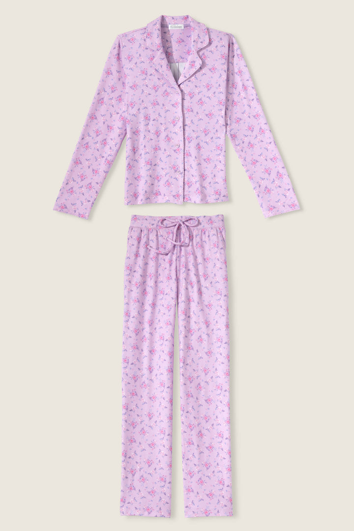 Women's classic pajama set with button-front notch collar top & tie waist pant.  Peachy jersey with lilac mini floral print.