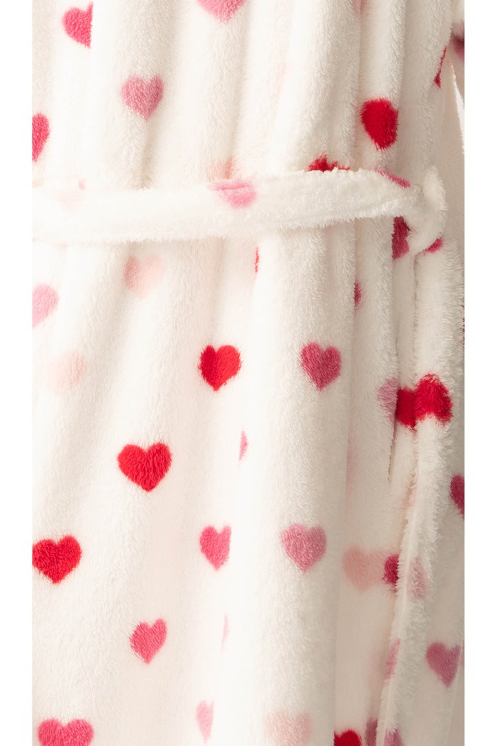 Women's plush white lounge robe with pink heart pattern.