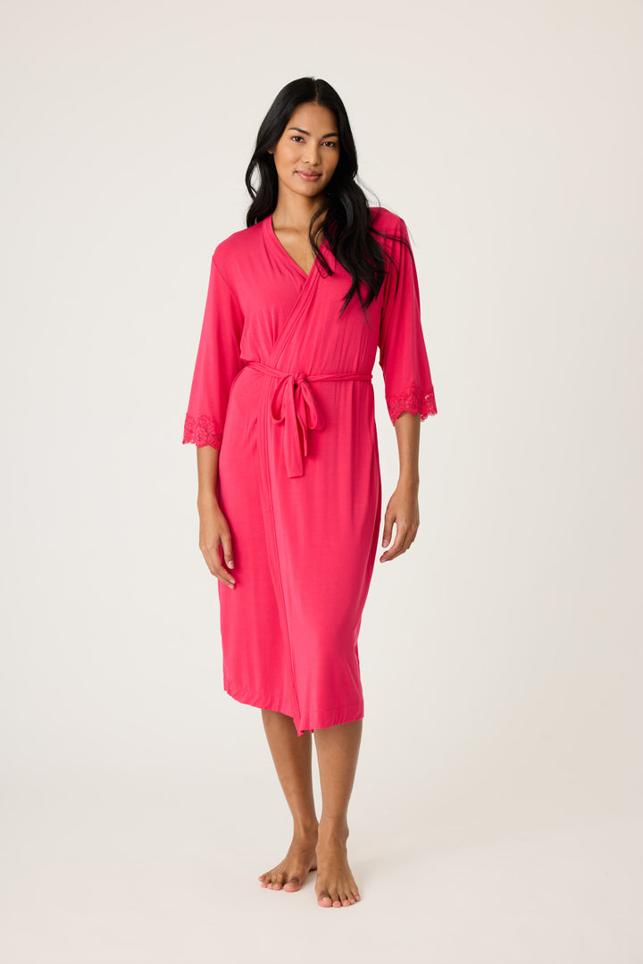Women's hot pink lounge robe with lace detail on sleeves.