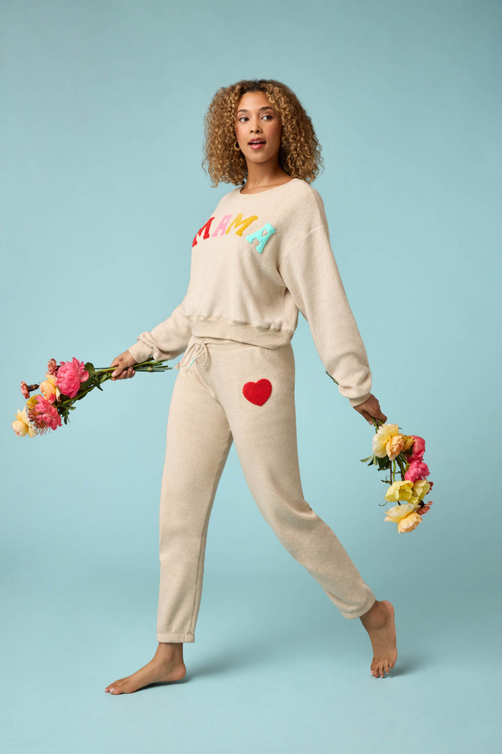 Women's oatmeal jogger set with multicolor MAMA boucle lettering applique on chest. Jogger with red heart applique in cloud terry with tie waist.