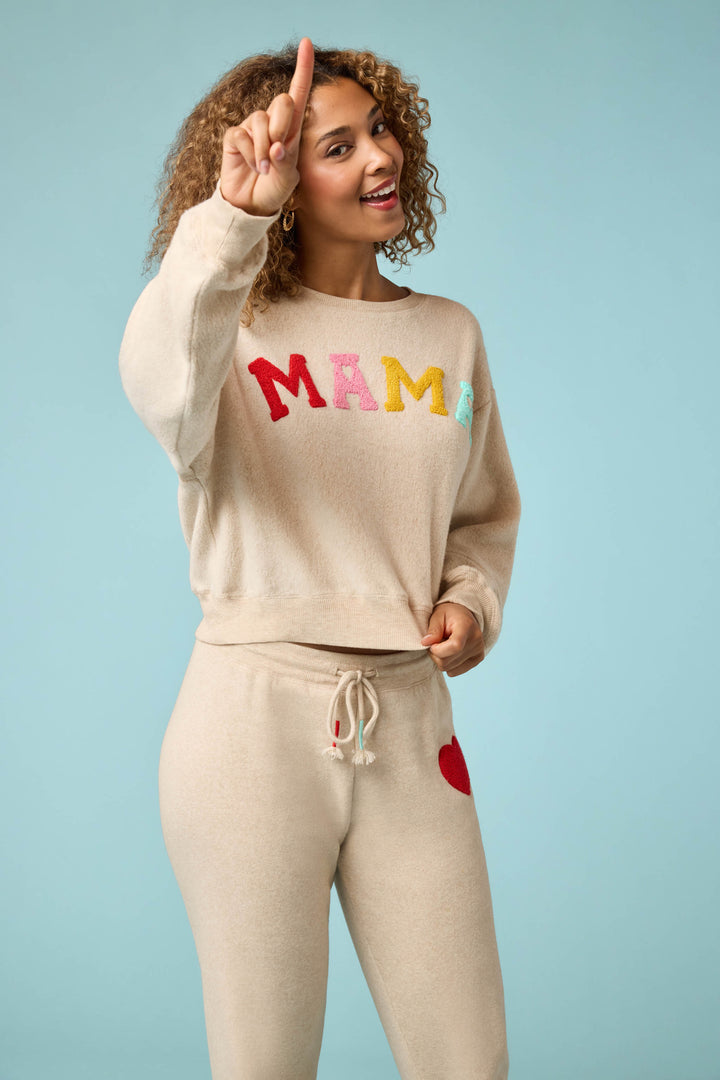 Women's oatmeal jogger set with multicolor MAMA boucle lettering applique on chest. Jogger with red heart applique in cloud terry with tie waist.