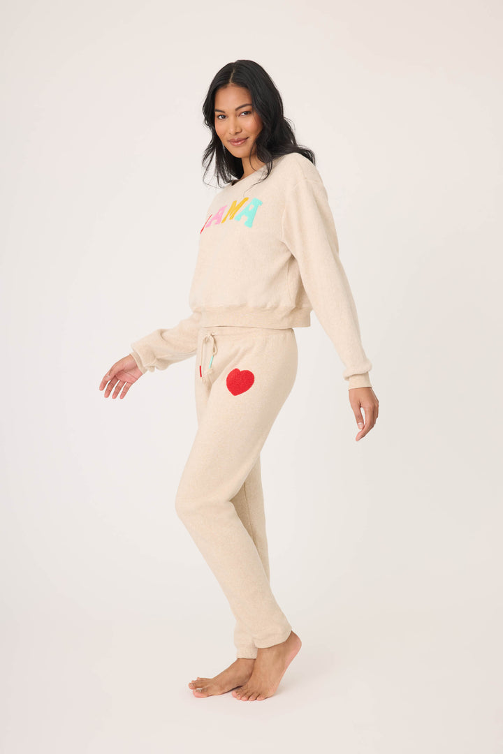 Women's oatmeal jogger set with multicolor MAMA boucle lettering applique on chest. Jogger with red heart applique in cloud terry with tie waist.
