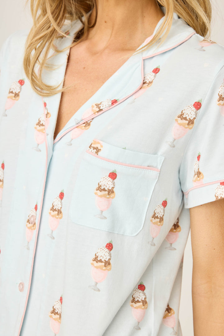 Women's light blue ice cream printed pajama short set. Short sleeve top & tie waist short with sunglass-shape sleep mask.
