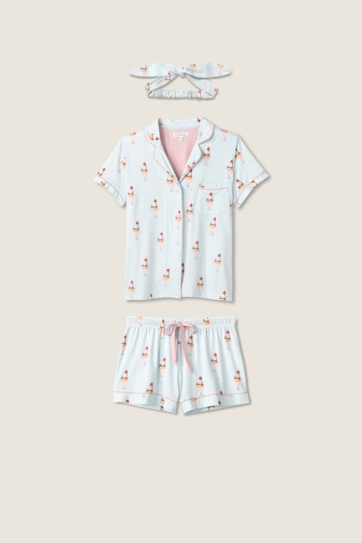 Women's light blue ice cream printed pajama short set. Short sleeve top & tie waist short with sunglass-shape sleep mask.