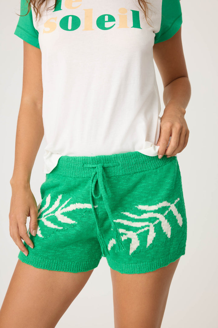 Women's green short wtih white palm print in cotton sweater knit.