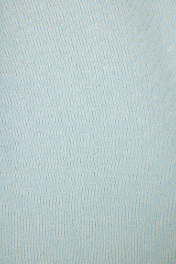 Women's blue melange lounge short with small rainbow embroidery on cuff.