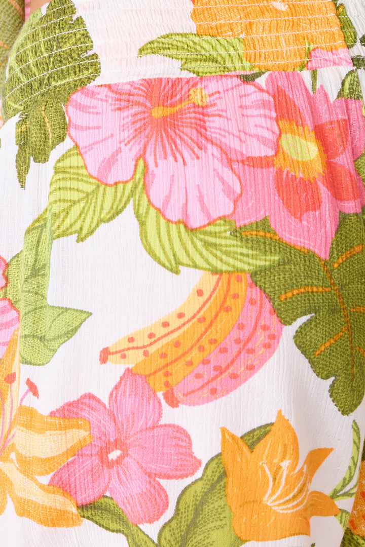 Women's bright tropical print lounge short in woven gauze. With smocked elastic waist.