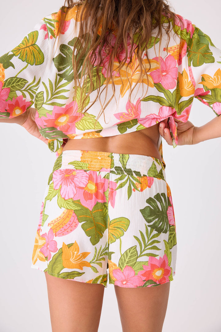 Women's bright tropical print lounge short in woven gauze. With smocked elastic waist.