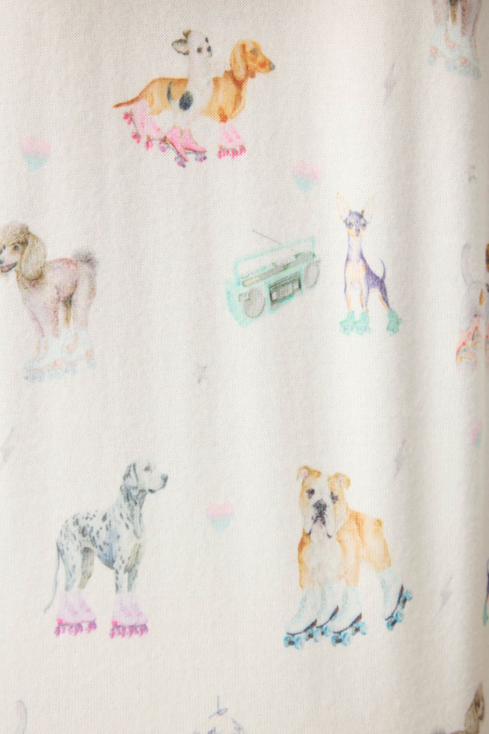 Women's ivory pajama short with dogs on rollerskates pattern. Relaxed fit with tie waist.