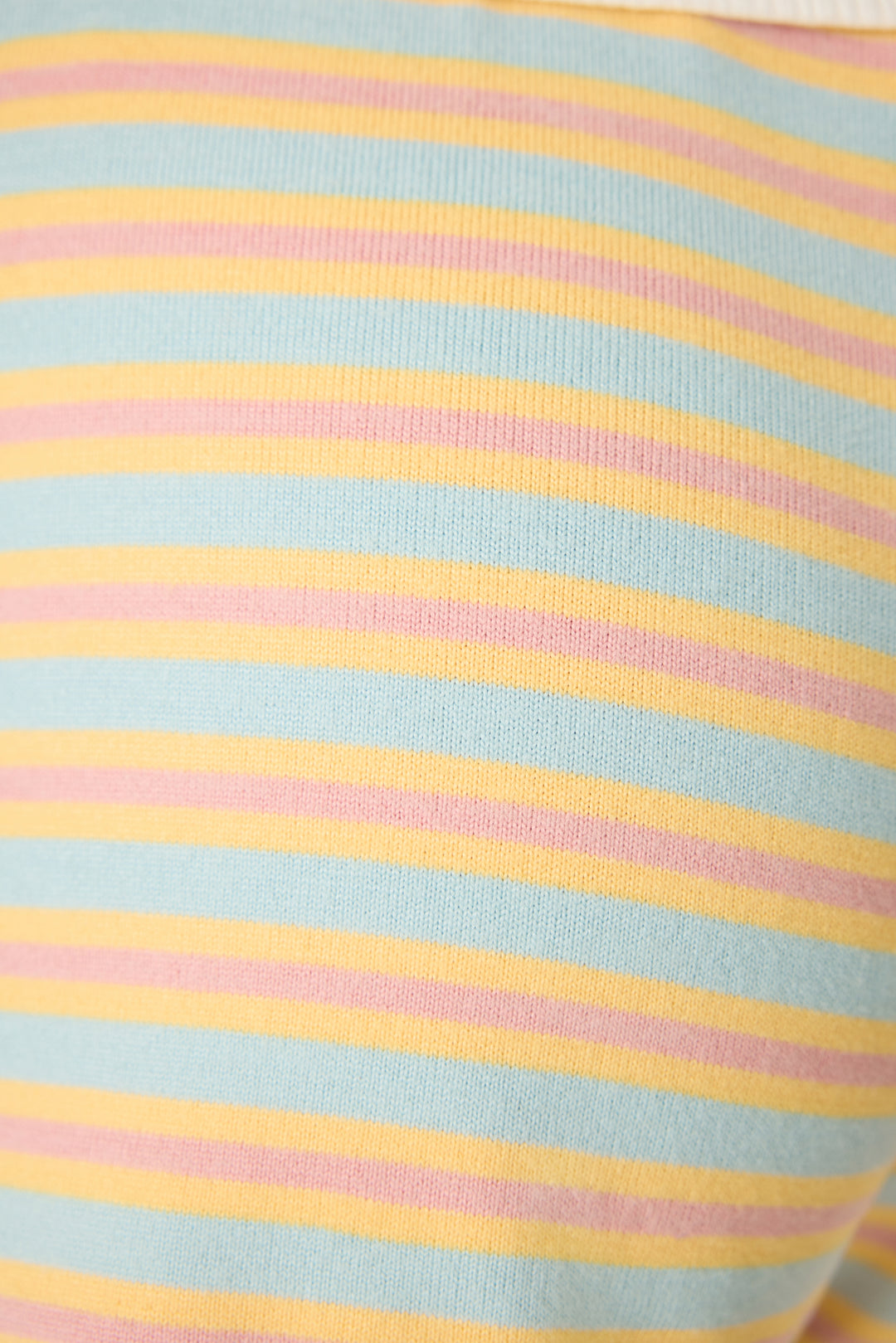Multi-striped sleep short in orange-sage-dusty pink. With small floral embroidery details.