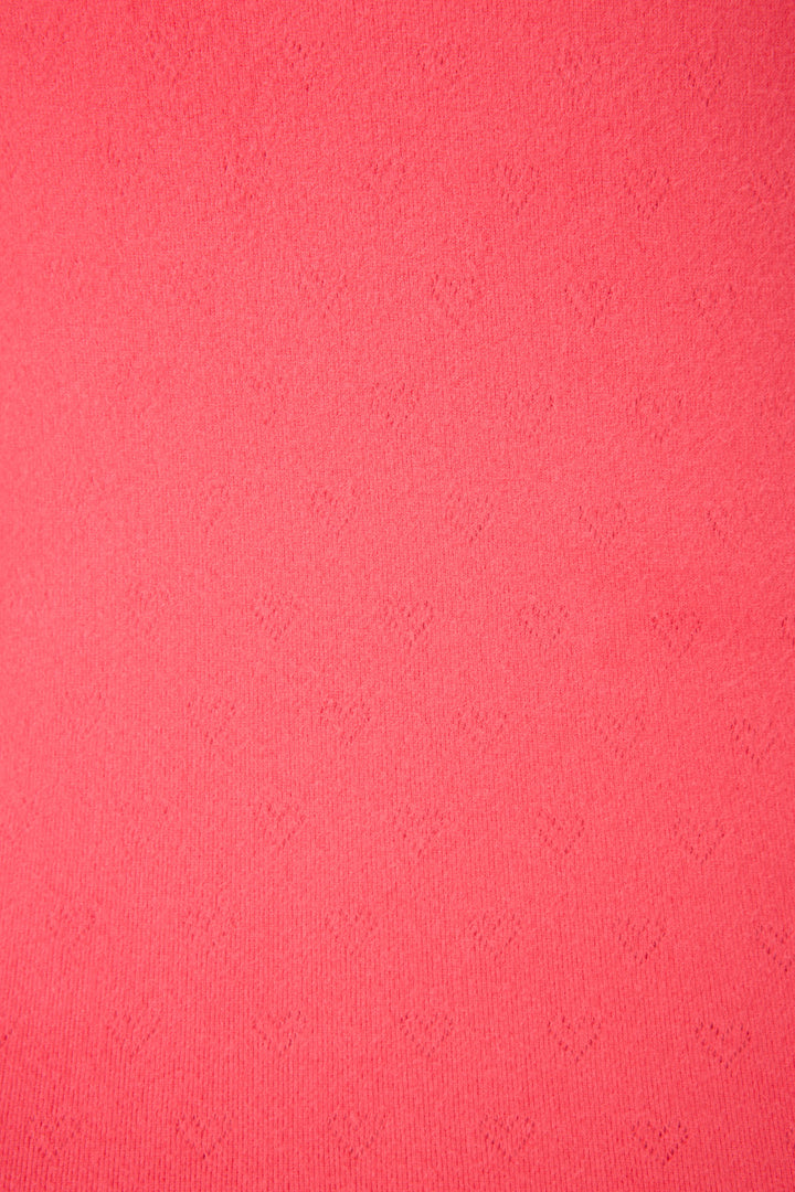 Bright pink sleep short for women in brushed heart-pointelle. Has curly edge hem & bow detail at waist.