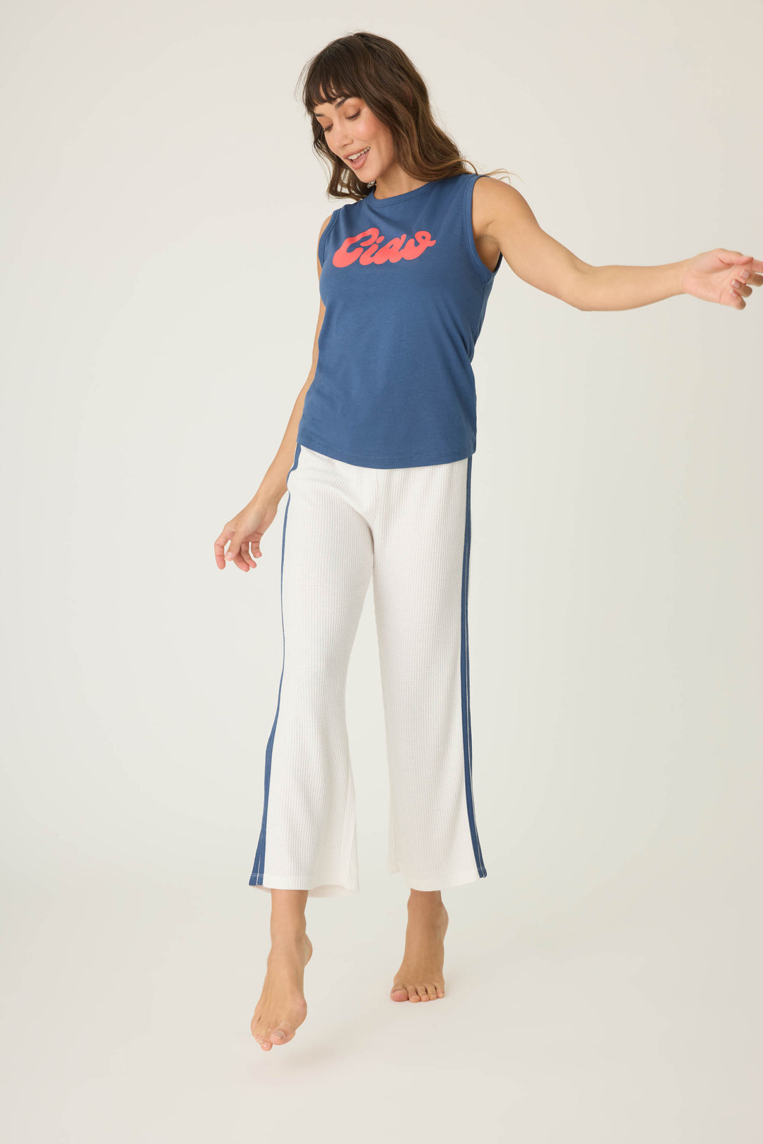 Navy sleeveless t-shirt with 'Ciao' red lettering graphic print on chest.