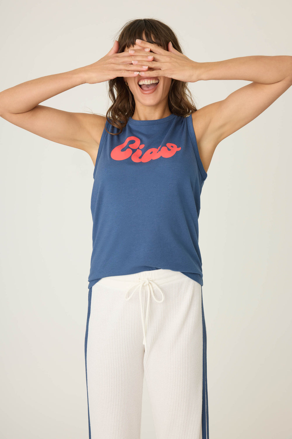 Navy sleeveless t-shirt with 'Ciao' red lettering graphic print on chest.