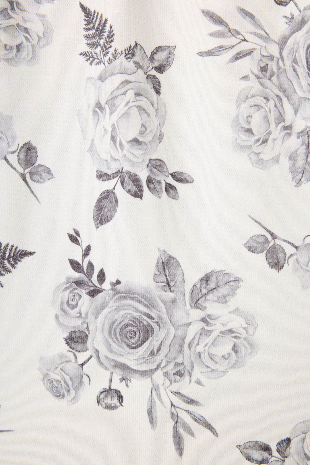 Women's white pj tank with black rose pattern.